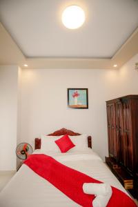 Letto o letti in una camera di Conico Đà Lạt Hotel