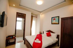 Letto o letti in una camera di Conico Đà Lạt Hotel