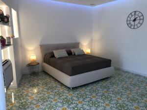 Posteľ alebo postele v izbe v ubytovaní Casa Mami - Luxury Apartment and Pool - Sorrento