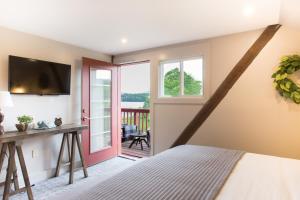 Katil atau katil-katil dalam bilik di Mountain Meadows Lodge