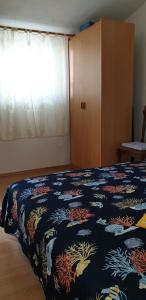 Postel nebo postele na pokoji v ubytování Apartment Monica