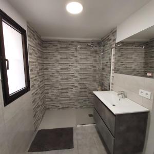A bathroom at Corralejo Garden&Relax