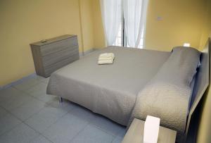 A bed or beds in a room at STANZA EUCALIPTO