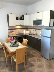 Η κουζίνα ή μικρή κουζίνα στο Apartments Bumbar
