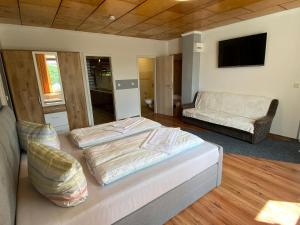 Postel nebo postele na pokoji v ubytování Pension Florion