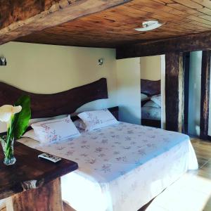 Ένα ή περισσότερα κρεβάτια σε δωμάτιο στο Brisa de Lavras