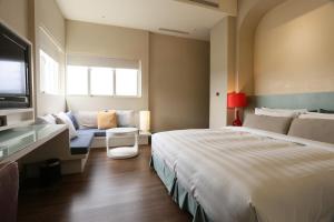 Katil atau katil-katil dalam bilik di City Suites - Taipei Nandong