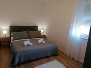 Posteľ alebo postele v izbe v ubytovaní Apartman Bella 2