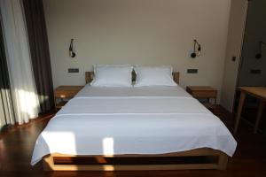Postel nebo postele na pokoji v ubytování Life Butiq Otel
