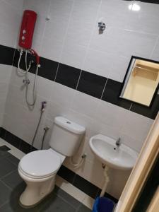 Ванная комната в LH Hotel Langkap Perak