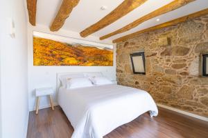 Postel nebo postele na pokoji v ubytování GOLDNATURE