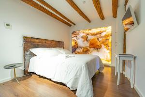Postel nebo postele na pokoji v ubytování GOLDNATURE