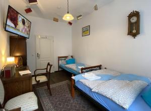 Ein Bett oder Betten in einem Zimmer der Unterkunft Hotelik Gdanska