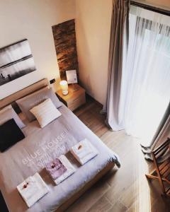 Postel nebo postele na pokoji v ubytování B&B Tenuta Legnate