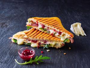 a sandwich cut in half on a table at ibis Hotel München Garching in Garching bei München