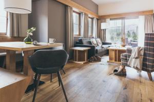 Posezení v ubytování PUR Suites & Chalets
