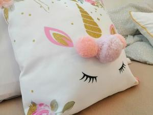 a pillow with a bunny face painted on it at Le 1970 in Grenoble