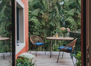 En balkong eller terrasse på Rotes Haus Bregenz See Wohnung