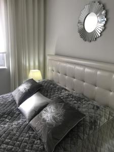 Posteľ alebo postele v izbe v ubytovaní Apartament Chanel Centrum