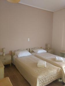 Katil atau katil-katil dalam bilik di Hotel Διεθνές