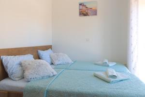 Postel nebo postele na pokoji v ubytování Villa Umag Seafront