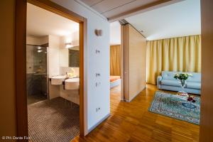 Ένα ή περισσότερα κρεβάτια σε δωμάτιο στο Residence SchioHotel