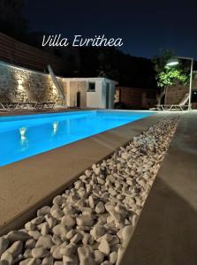 The swimming pool at or close to Villa Evrithea