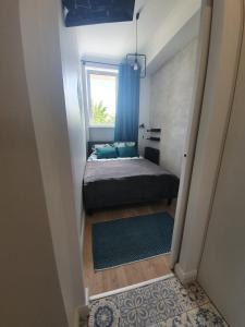 Ліжко або ліжка в номері Monte Gdynia Apartament