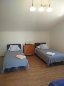 Postel nebo postele na pokoji v ubytování Planika Apartments 1