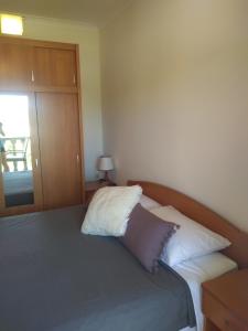 Postel nebo postele na pokoji v ubytování Planika Apartments 1