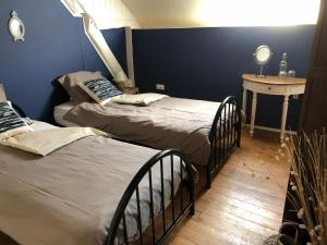 Postel nebo postele na pokoji v ubytování Maison Moulin Bousset