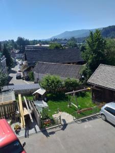 an aerial view of a village with houses at Sobe SM0LEJ in Bled