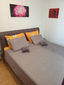 מיטה או מיטות בחדר ב-Villa MiMi