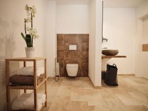 Kúpeľňa v ubytovaní SEE Moment Appartements ADULTS ONLY + 37 fotografií
