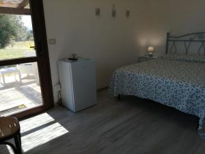 Voodi või voodid majutusasutuse Istentales Alghero toas