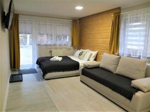 Posezení v ubytování Apartamenty Milka