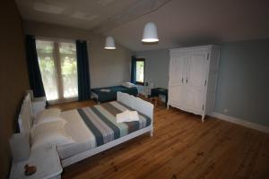 Postel nebo postele na pokoji v ubytování Chambre d'hotes de Jacobiel