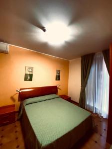 Postel nebo postele na pokoji v ubytování L'Aurora + 18 fotografií