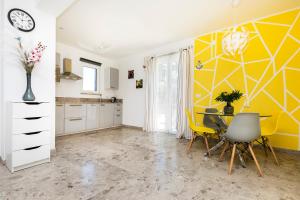 Kuchyň nebo kuchyňský kout v ubytování Apartment Apsyrtides