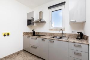 Kuchyň nebo kuchyňský kout v ubytování Apartment Apsyrtides