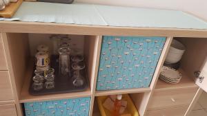 a toy kitchen with a cupboard with a drawer at Na samotě u lesa -Rasovna in Mšecké Žehrovice +10 photos