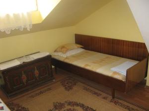 two twin beds in a room with a window at Кристи in Shumen