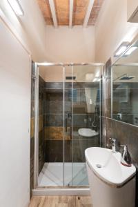 a bathroom with a shower and a sink at Terrace apt in Piazza Strozzi-center of Florence in Florence