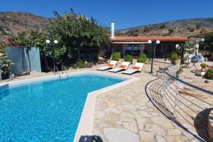 The swimming pool at or close to Villa Aliki