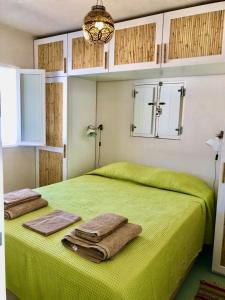 Ένα ή περισσότερα κρεβάτια σε δωμάτιο στο Cabana 2 da Comporta
