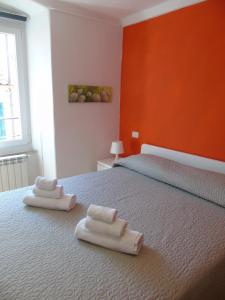 A bed or beds in a room at Affittacamere SveMilla