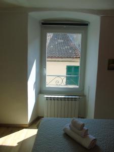 A bed or beds in a room at Affittacamere SveMilla