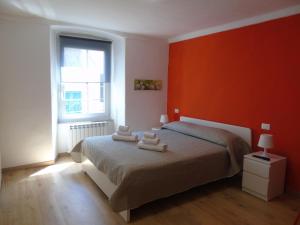 A bed or beds in a room at Affittacamere SveMilla