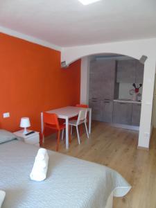 A bed or beds in a room at Affittacamere SveMilla