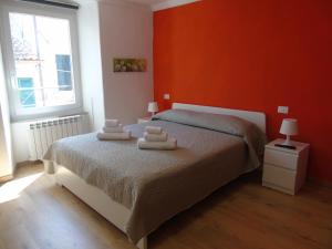 A bed or beds in a room at Affittacamere SveMilla